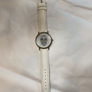 Watch with sugar skull on face